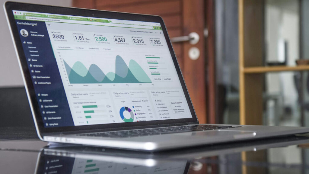 laptop showing reports graphs